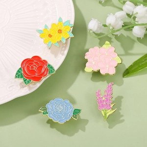 Vibrant floral enamel pins set featuring colorful flowers on a zinc alloy gold-plated base