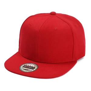 Detail of red snapback baseball cap in twill cotton with flat brim and adjustable strap