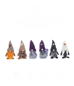 Close-up of six knitted Christmas coffee gnomes with heart patterns and soft fiber beards