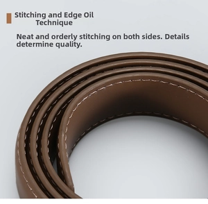 Detail shot of brown leather belt with white contrast stitching and smooth oil edge finish