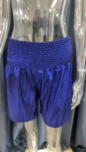 Detail of high-waist metallic navy shorts with elastic waistband and glossy texture