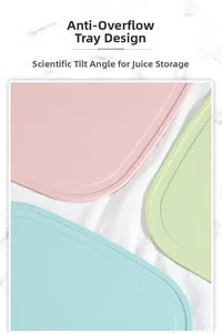 Detail of plastic cutting boards with textured surface and anti-spill juice groove design