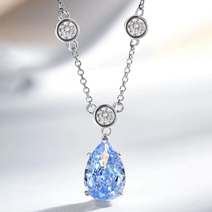 S925 sterling silver necklace with teardrop blue gemstone and ice-cut pendant detailing