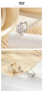 Detail showing gold and silver hoop earrings with square cubic zirconia in tiling display