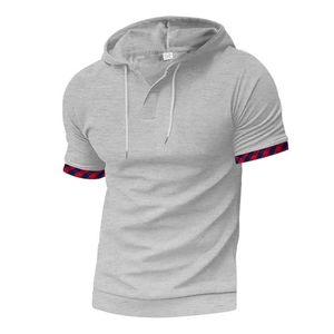 Detail of grey short sleeve hoodie with plaid patchwork sleeve cuffs for men