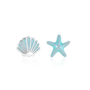 S925 sterling silver starfish and seashell asymmetrical studs in sky blue enamel