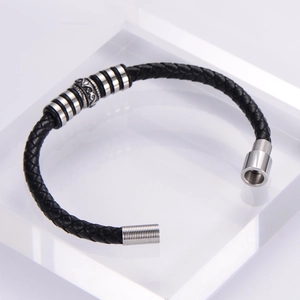 Men's punk braided leather bracelet with silver stainless steel accents on acrylic block