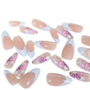 Almond-shaped press-on nails set with nude pink base, French tips and floral bow designs