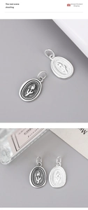 Detailed close-up of S925 sterling silver tulip oval pendants in bright and oxidized finishes