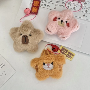 Detailed view of plush star keychains with cute embroidery, bells and lucky tags