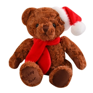 Brown Christmas Teddy Bear plush toy with red hat and scarf on white background