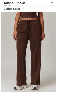 Detail view of coffee high-waisted wide-leg sweatpants with drawstring and front seam pleats