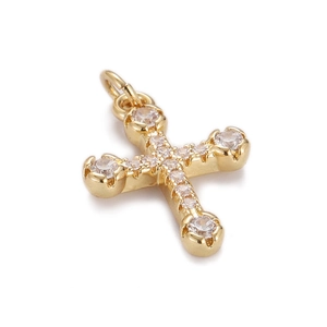 Detailed view of a gold-plated hip-hop cross pendant set with sparkling clear zircons
