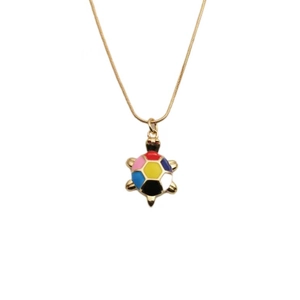 Gold plated turtle necklace featuring colorful enamel shell detail on a white background