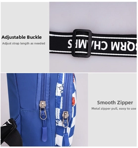 Detail of blue kids chest bag showing adjustable strap and smooth metal zippers