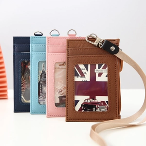 Set of four cross-grain PU leather card holders in navy, light blue, pink, and brown