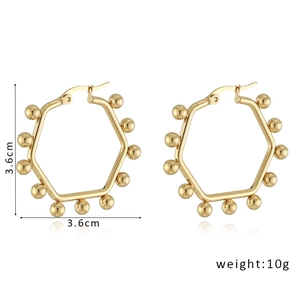 Detail showing 3.6cm gold hexagonal hoop earrings with small beads and 10g weight