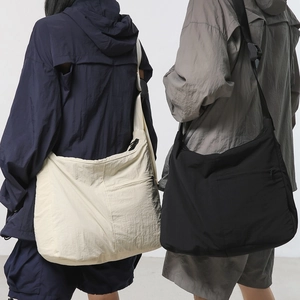 Japanese style nylon crossbody bag with large capacity in black and beige colors