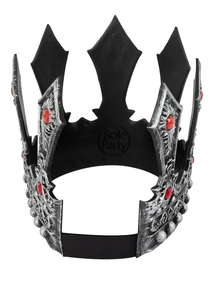 Close-up of gothic king crown featuring silver relief patterns and red gemstones