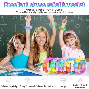 Close-up of colorful rainbow fidget toy bracelets worn by girls to relieve stress and anxiety