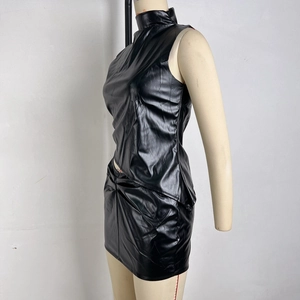 Close-up of the black PU leather high-neck top with sleeveless pleated texture design