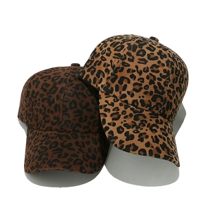 Women's leopard print baseball caps in brown and tan colors with curved brim