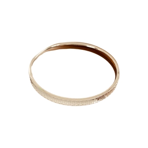 Minimalist rose gold round concave bracelet with intricate diamond grid texture pattern