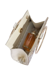 Top view of gold diamond PU clutch bag showing interior space for phone and perfume