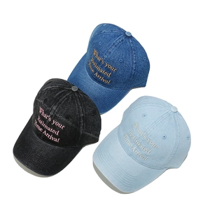 Three washed denim baseball caps with embroidery in dark blue, black, and light blue