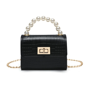 Black crocodile embossed mini jelly bag with pearl handle and gold chain strap for kids