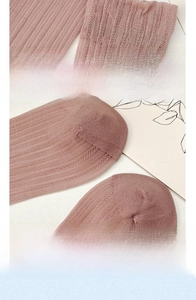 Detail of high-elastic cuff and seamless toe on breathable mesh crew socks in rose pink