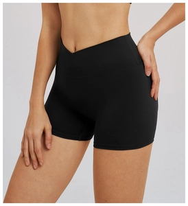 Close-up of black yoga shorts featuring a criss-cross V-waistband and high elasticity