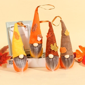 Set of 4 autumn felt gnome dolls with maple leaf and pumpkin decorations for home decor