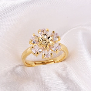 Exaggerated gold flower ring with colorful cubic zirconia in adjustable open design