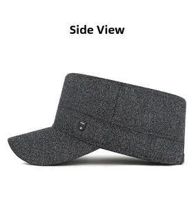 Side view detail of a men's winter thermal flat cap with textured grey sport fabric