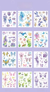 Grid display of waterproof glitter tattoo stickers with mermaid, butterfly, and ocean themes