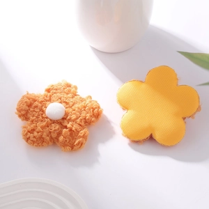 Detailed front and back view of 8cm plush teddy velvet flower with white pom-pom center