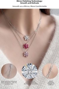 Detail of S925 silver layered necklace with pear-cut cubic zirconia flower pendants