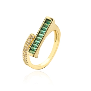 Close-up of 18K gold plated ring with emerald-cut green zircon and small white stones