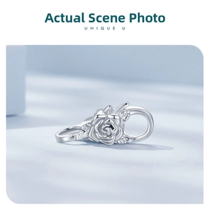 Detailed close-up of a 925 sterling silver lobster clasp with rose flower relief pattern