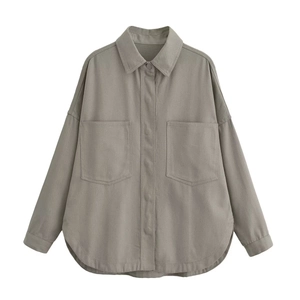 Detailed flat lay of taupe washed denim shirt jacket with large pockets and lapel collar