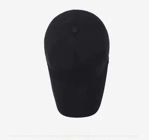 Top-down view of black baseball cap featuring a shield-shaped R logo and quick-dry fabric
