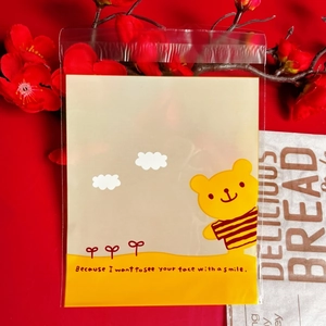 Close-up of cute cartoon bear self-adhesive packaging bag for cookies and candy