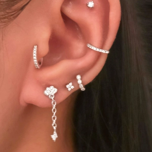 S925 silver needle cloud and lightning earrings with zircons shown on model ear