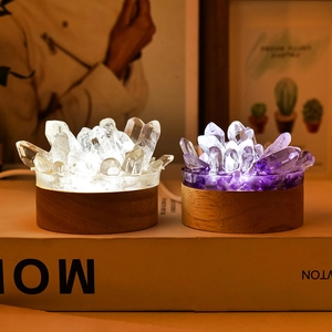 Natural amethyst and white crystal cluster night lamps on round wooden bases
