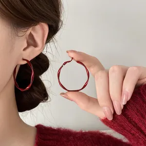 Retro geometric twisted hoop earrings in deep red lacquer finish with S925 silver needles