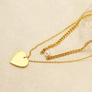 Zweilagige 18K vergoldete Halskette mit Herzanhänger und eleganter weißer Perle