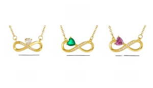 Detailed view of infinity heart necklaces in gold finish with various colored gems