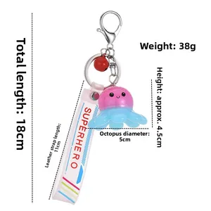 Tableau des tailles détaillé pour le porte-clés poulpe rose avec dimensions en cm