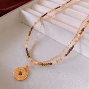 Vintage double layer necklace with gold plated compass pendant and tiger eye stone beads